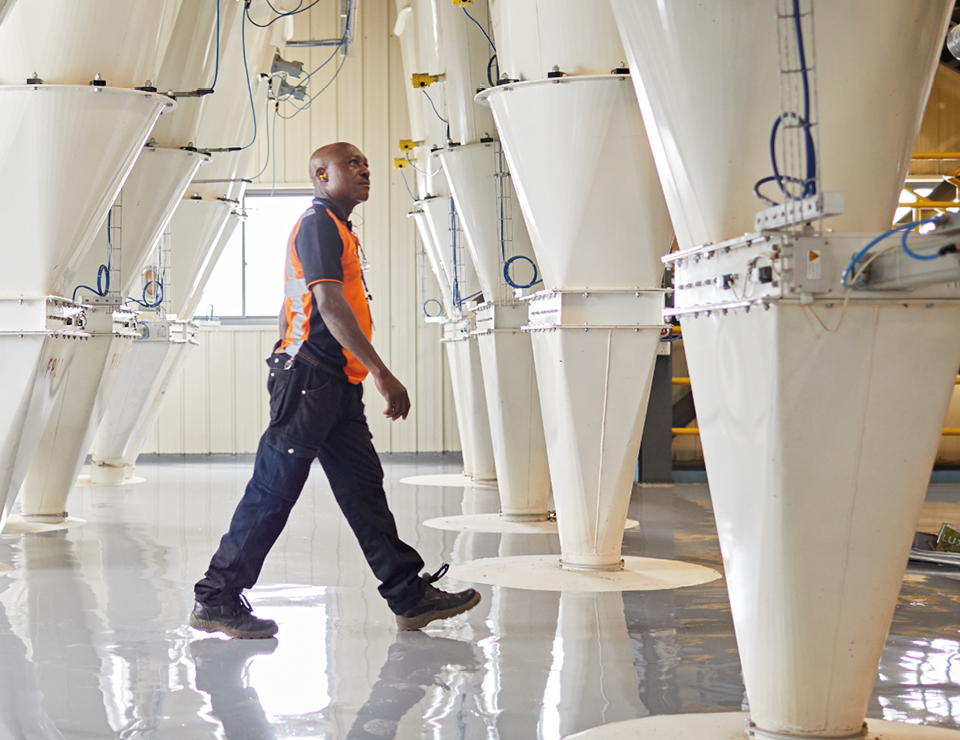 Person walking through grain facility