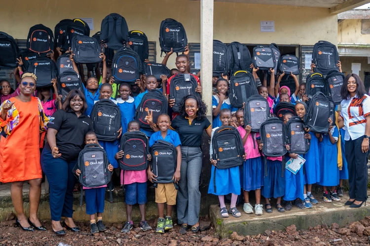 Awarding Scholarships to 50 Outstanding Students and Donating School Supplies to Bekoko Community